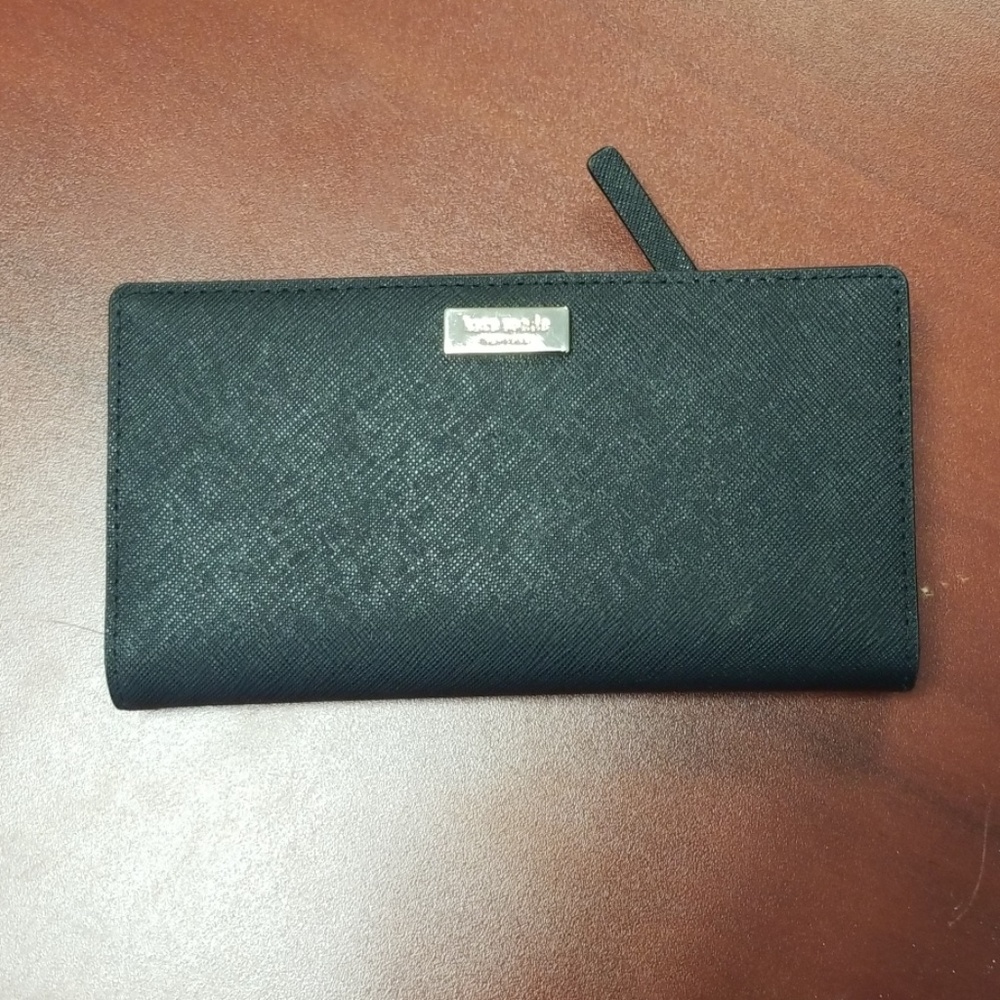Brand new never used Kate Spade Wallet WLRU2673